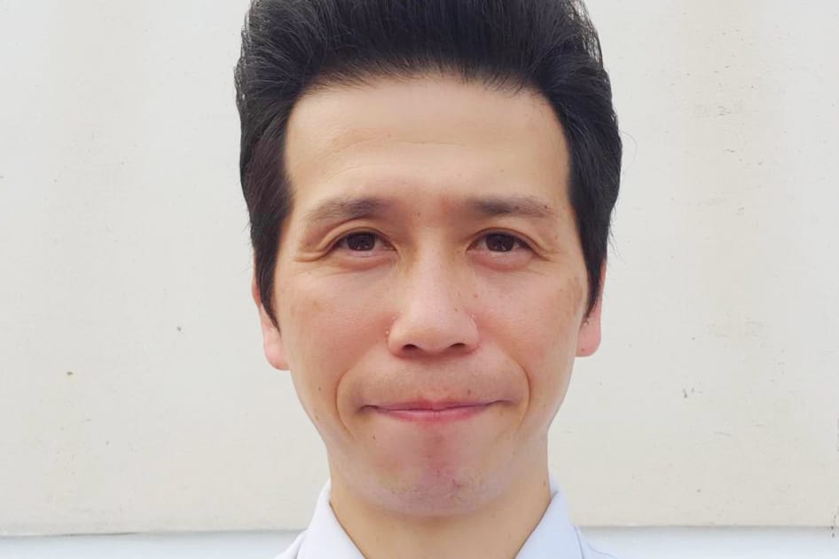 店長 岡田 慶三